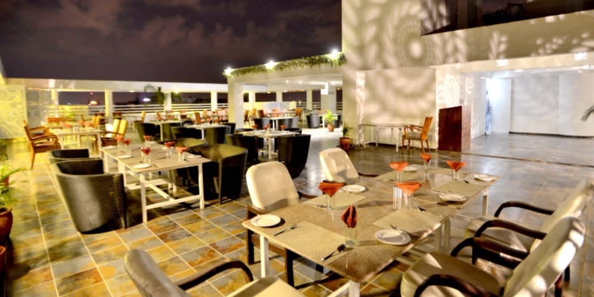 Rooftop poolside restaurant in Vadodara